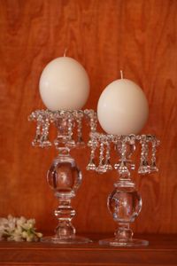 30 cm Single glass candle stick + small taperd. 30 cm Single glass candle stick + ostrich egg. 25 cm Single glass candle stick + lida crystal